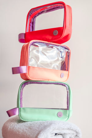 ESTUCHE TRANSPARENTE PEQUEÑO - FRESA NEÓN