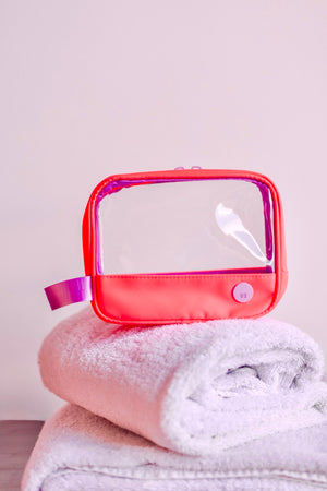 ESTUCHE TRANSPARENTE PEQUEÑO - FRESA NEÓN